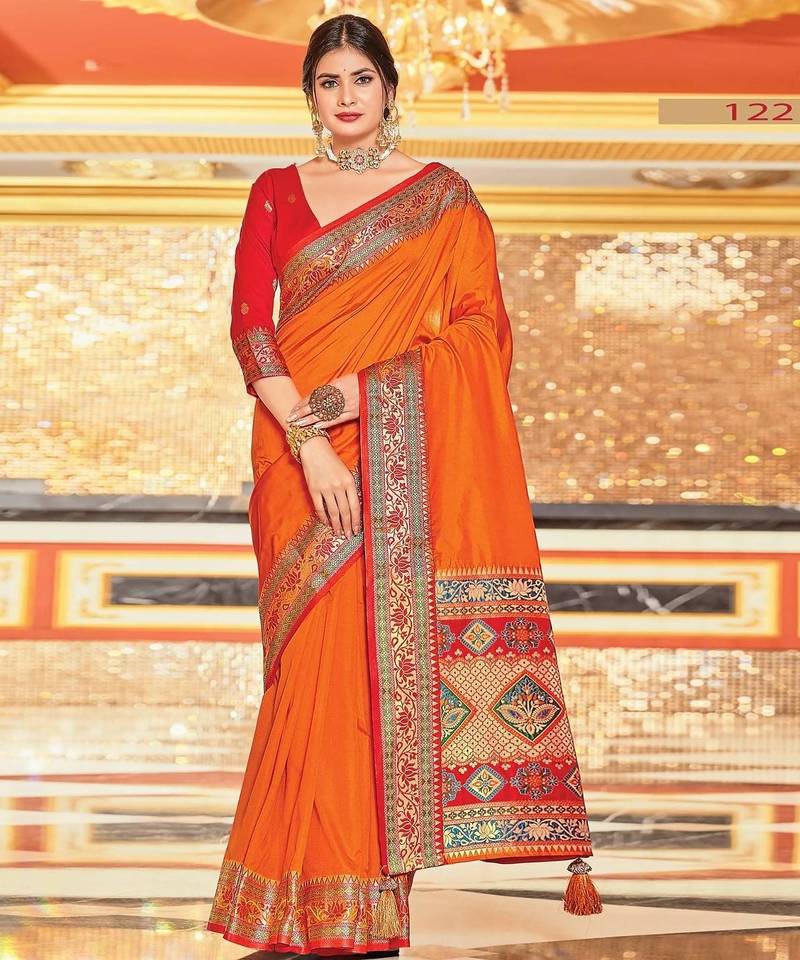 Orange colour plain border work silk saree with blouse