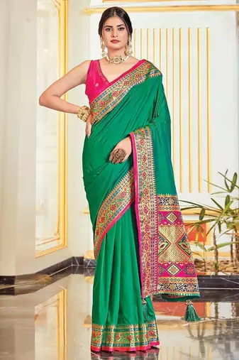 Green colour plain border work silk saree with blouse