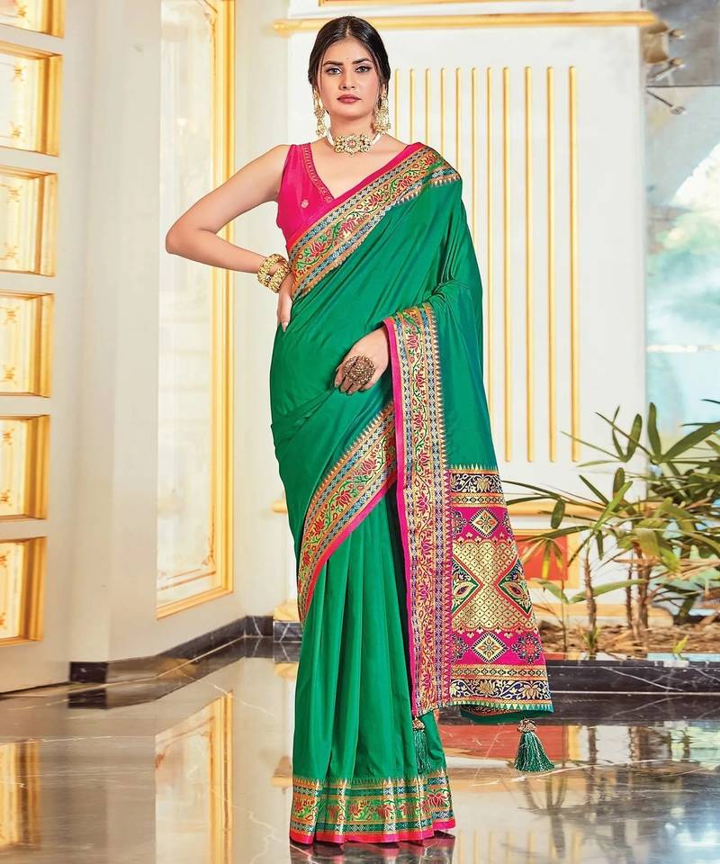 Green colour plain border work silk saree with blouse