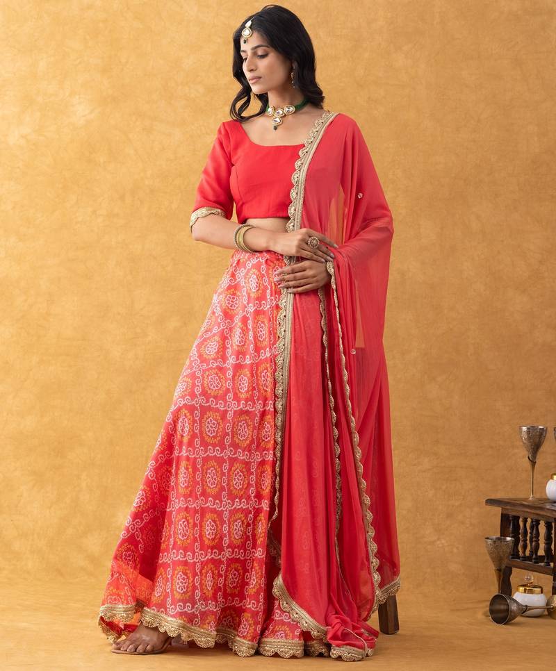 Red Bandhani Print Lehenga Set with choli and Embellished Dupatta