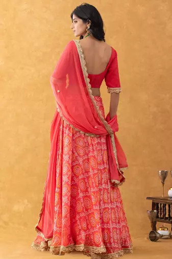 Red Bandhani Print Lehenga Set with choli and Embellished Dupatta