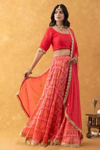Red Bandhani Print Lehenga Set with choli and Embellished Dupatta