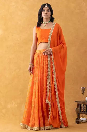 Orange Bandhani Lehenga Set with choli and Embellished Dupatta