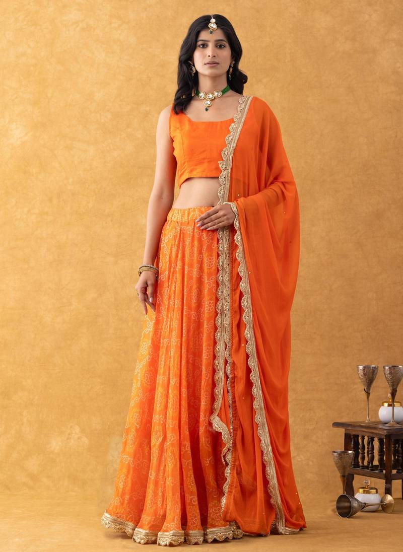 Orange Bandhani Lehenga Set with choli and Embellished Dupatta
