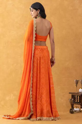Orange Bandhani Lehenga Set with choli and Embellished Dupatta