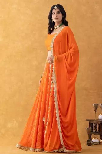 Orange Bandhani Lehenga Set with choli and Embellished Dupatta