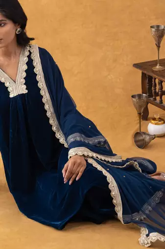 blue velvet suit set with gold embellished dupatta