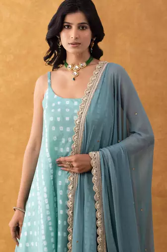 green bandhani print silk suit set with dupatta
