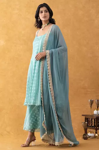 green bandhani print silk suit set with dupatta