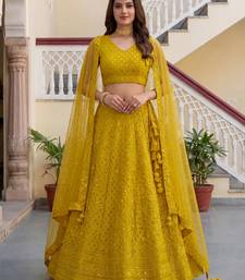  yellow embroidered georgette haldi lehenga set choli with dupatta