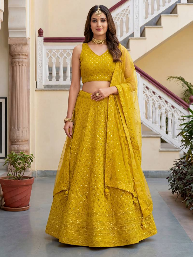  yellow embroidered georgette haldi lehenga set choli with dupatta