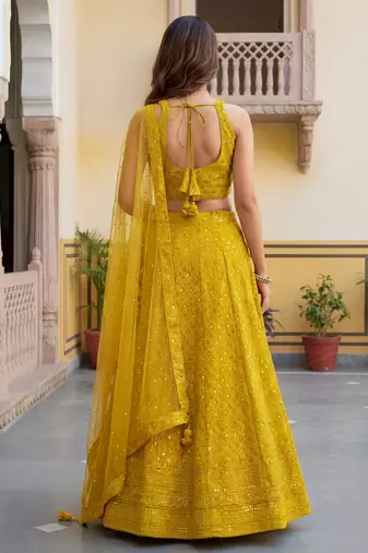  yellow embroidered georgette haldi lehenga set choli with dupatta