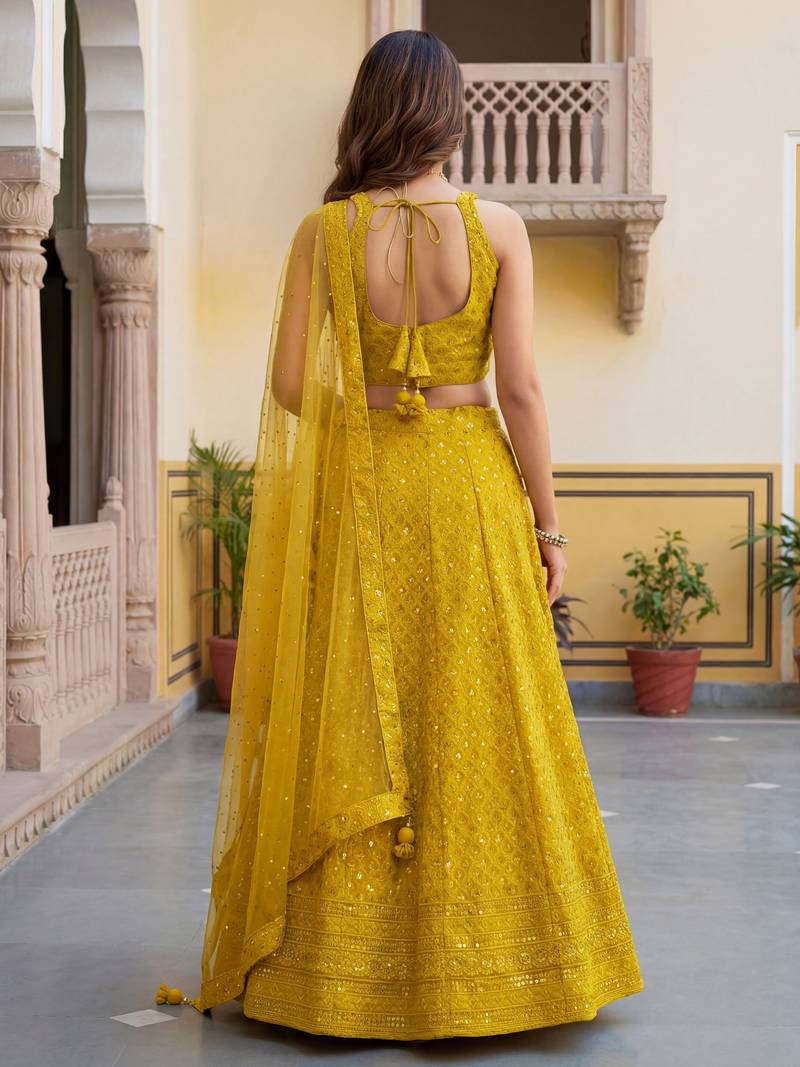  yellow embroidered georgette haldi lehenga set choli with dupatta