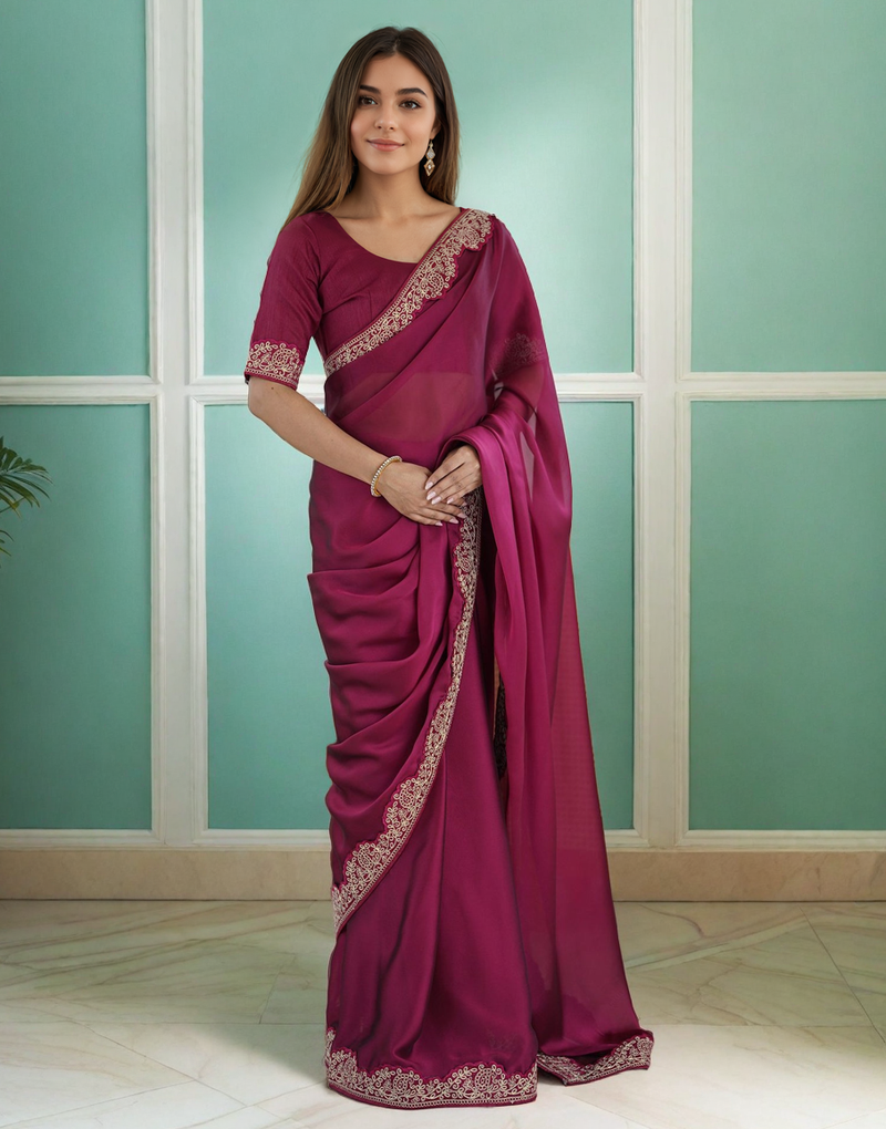 Elegant magenta rangoli silk saree with intricate coding work
