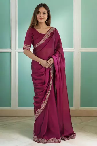Elegant magenta rangoli silk saree with intricate coding work