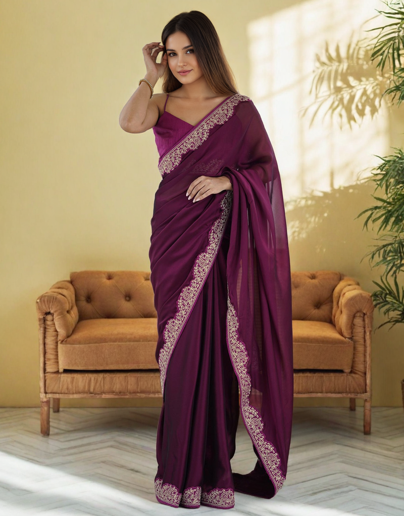 Elegant wine rangoli silk saree with intricate coding work