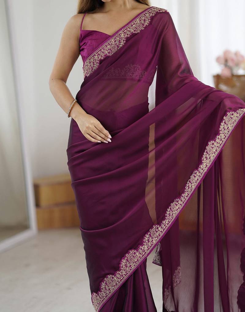 Elegant wine rangoli silk saree with intricate coding work