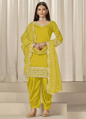 Yellow roman silk embroidered salwar suit 1