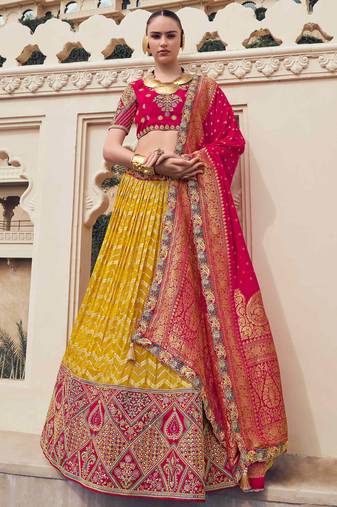 yellow embroidered organza lehenga set choli with dupatta