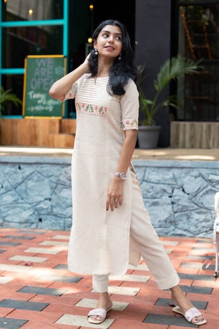 white embroidered cotton kurta and pant