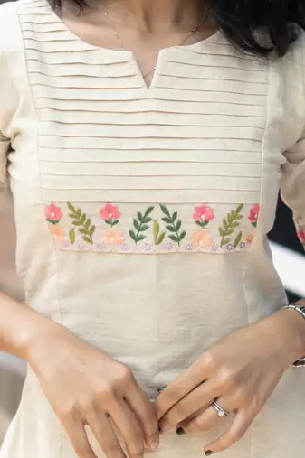 white embroidered cotton kurta and pant
