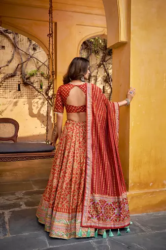 Orange silk sequin embroidered chaniya choli