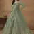 Pista green net emboidered wedding wear anarkali suit