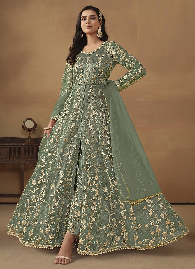 Pista green net emboidered wedding wear anarkali suit