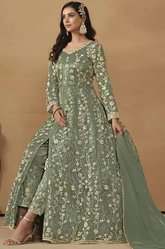 Pista green net emboidered wedding wear anarkali suit