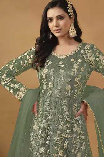 Pista green net emboidered wedding wear anarkali suit