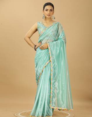 sea green net saree with embroidered blouse 1