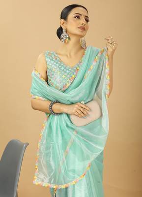 sea green net saree with embroidered blouse 4