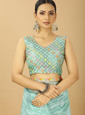 sea green net saree with embroidered blouse 5