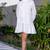 White cotton ruffle dress