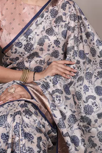 off white tasar art silk blend printed saree with shining viscose border