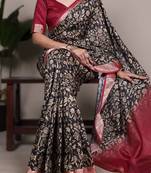 black tasar art silk printed saree with shining viscose border
