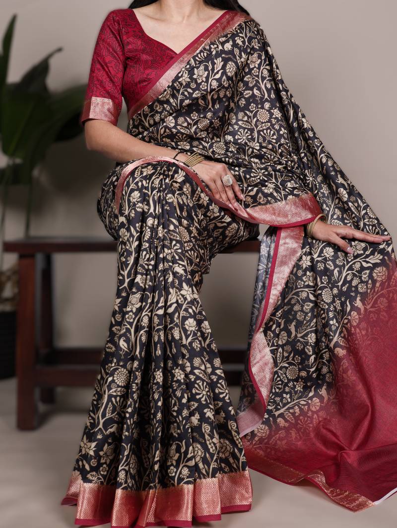 black tasar art silk printed saree with shining viscose border