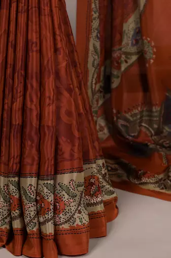orange printed crepe saree with matching blouse