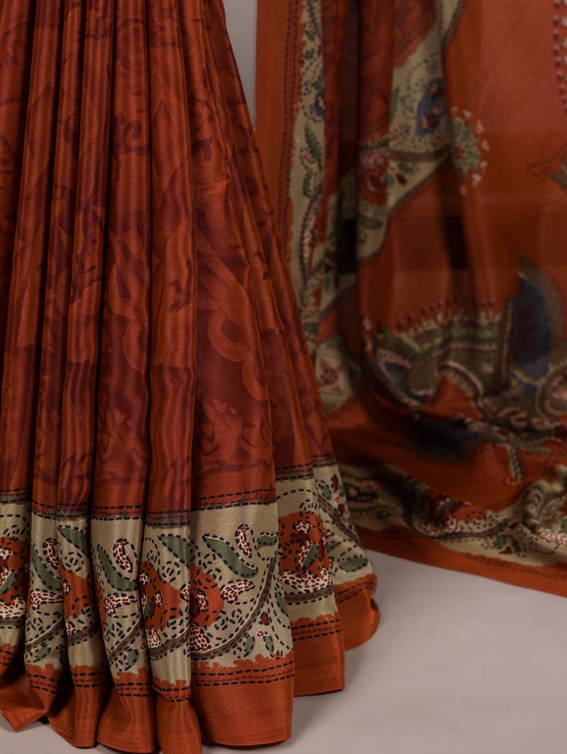 orange printed crepe saree with matching blouse