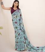 sea green floral lurex brasso saree with natural art silk blouse