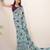 sea green floral lurex brasso saree with natural art silk blouse