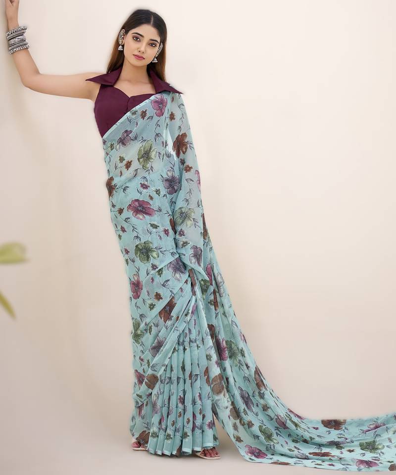 sea green floral lurex brasso saree with natural art silk blouse