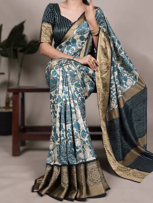 sea blue printed tasar art silk blend saree with shimmering viscose border 1