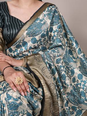 sea blue printed tasar art silk blend saree with shimmering viscose border 2