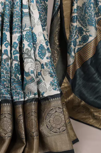 sea blue printed tasar art silk blend saree with shimmering viscose border