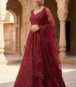 Maroon embroidered soft net lehenga choli with dupatta