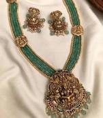 Antique gold-plated lakshmi long haram set with green beads & jhumkas – traditional temple jewelry