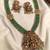 Antique gold-plated lakshmi long haram set with green beads & jhumkas – traditional temple jewelry