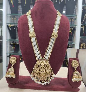 Antique gold-plated lakshmi long haram set with white beads & jhumkas     traditional temple jewelry 4