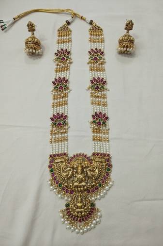 Traditional lakshmi temple long haram necklace set for women | gold-plated pearl, ruby & green stone bridal jewellery